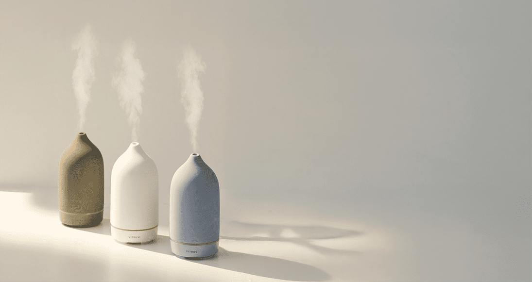 Essential oil bottles on a light background